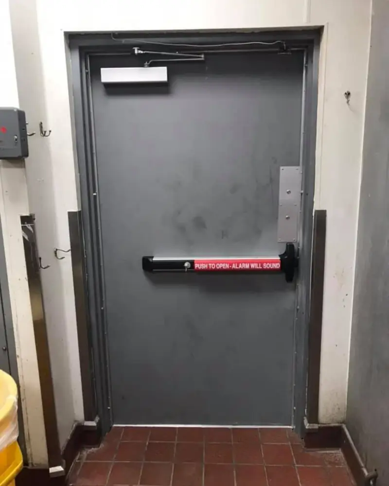 Commercial steel door with panic hardware