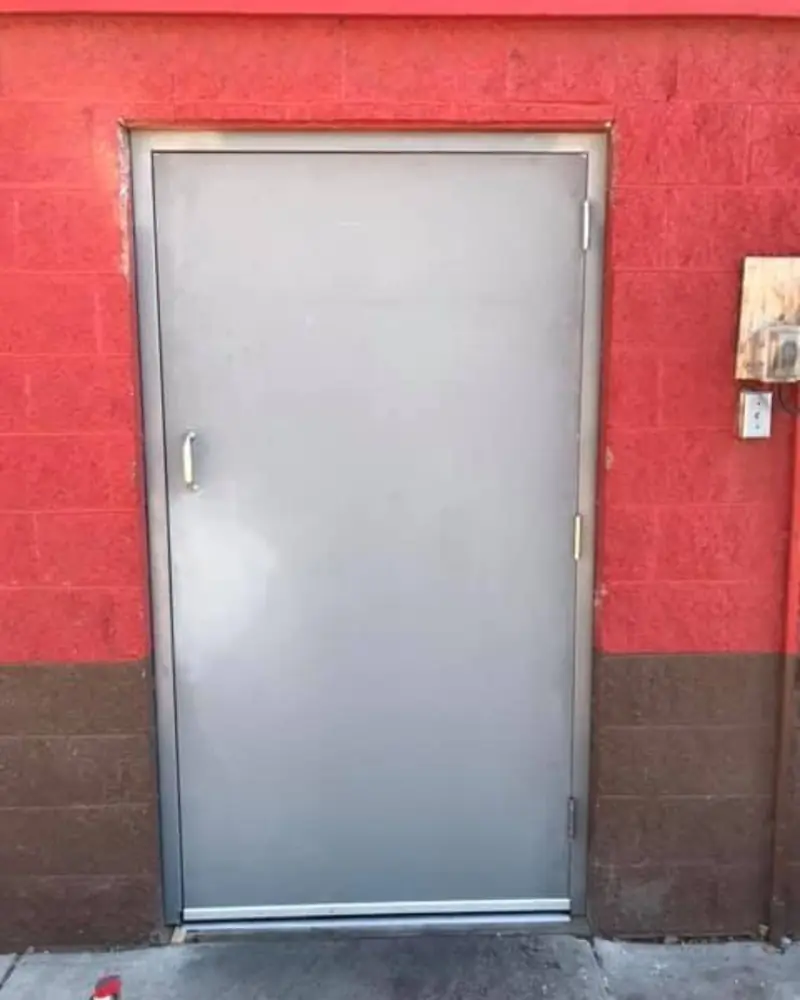 Exterior steel service door on a commercial building in Albuquerque